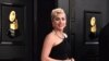 Bintang pop Lady Gaga tiba di karpet merah perhelatan Grammy ke-64 yang digelar di MGM Grand Garden Arena, Las Vegas, pada 3 April 2022. (Foto: Invision/AP/Jordan Strauss)