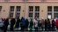 People queue up in front of the Ukrainian embassy to receive a dose of COVID-19 vaccine, in Berlin, Germany, March 10, 2022.