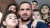 This August 17, 2021, image courtesy of Mohammad Ehsan Saadat shows Ehsan Saadat, a 33-year-old Afghan, who recently arrived in Canada, posing with his wife and his children in Toronto.