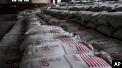 FILE - Sacks of food earmarked for the Tigray and Afar regions sit in piles in a warehouse of the World Food Program (WFP) in Semera, the regional capital for the Afar region, in Ethiopia, Feb. 21, 2022.