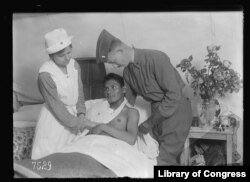 An unidentified citizen of the Choctaw Nation of Oklahoma convalescing in an American tent hospital in Auteuil, France, c. 1918.