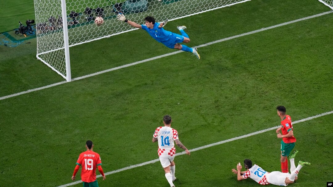 Croatia's Josko Gvardiol, second right, scores the opening goal during the World Cup third-place playoff soccer match between Croatia and Morocco at Khalifa International Stadium in Doha, Qatar, Dec. 17, 2022. 