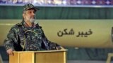 FILE - In a photo made available Feb. 9, 2022, on the official website of the Iranian Revolutionary Guard Corps Sepahnews shows Gen. Amir Ali Hajizadeh, commander of the aerospace division of the Iran's Revolutionary Guard, speaking at a podium at an undisclosed location in Iran.
