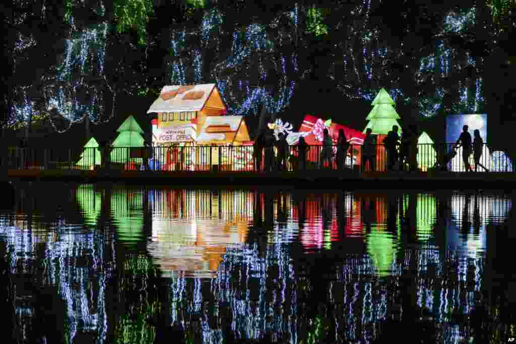 Locals attend to Chinese Lantern Festival in Santiago, Chile, Jan. 4, 2023. 