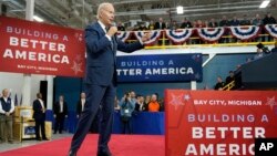 FILE - President Joe Biden speaks about manufacturing jobs and the economy at SK Siltron CSS, a computer chip factory in Bay City, Michigan, Nov. 29, 2022.