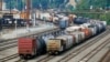 FILE - Freight cars wait to be hauled out of the Norfolk Southern Conway Terminal in Conway, Pennsylvania, Sept. 15, 2022. 