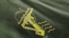 علامت سپاه پاسداران انقلاب اسلامی بر یک یونیفورم نظامی