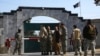 FILE - Security stands guard in front of the Pakistan embassy in Kabul, Afghanistan, Nov. 4, 2019.