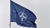 FILE - A flag of the North Atlantic Treaty Organization (NATO) flies at its headquarters in Brussels on Nov. 16, 2022. 