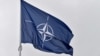 FILE - A flag of the North Atlantic Treaty Organization (NATO) flies at its headquarters in Brussels on Nov. 16, 2022. 