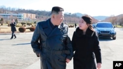 This undated photo provided on Nov. 27, 2022, by the North Korean government shows North Korean leader Kim Jong Un and his daughter at an unidentified location in North Korea.