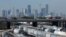 FILE - The Houston, Texas, skyline is seen from a railroad yard on March 6, 2019. 