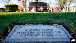 "BLESS THIS UNKNOWN BOY," says the headstone of the grave of a 4-year-old whose body was found in a box decades ago in Philadelphia. Advances in science and technology made it possible for investigators to track down the boy's identity. The grave marker will be updated with his name: Joseph Augustus Zarelli.