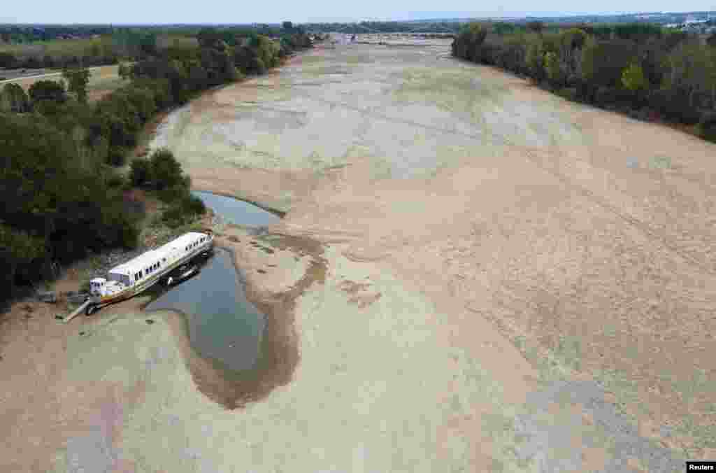 An aerial view shows a branch of the Loire River as historical drought hits France, in Loireauxence, Aug. 16, 2022. 