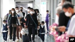 Du khách Trung Quốc đến sân bay Suvarnabhumi của Thái Lan. Trung Quốc là thị trường cung cấp du khách đến Thái Lan đông đúc nhất.