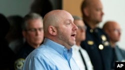 Chesapeake City Manager Chris Price speaks to reporters after a mass shooting at a Walmart, Nov. 23, 2022, in Chesapeake, Va.