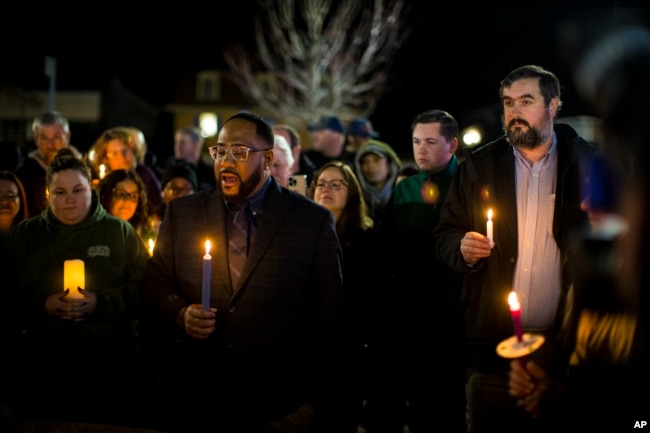 Newport News Councilman Elect John Eley, South District 3, speaks at a candlelight vigil in honor of Richneck Elementary School first-grade teacher Abby Zwerner at the School Administration Building in Newport News, Va., Monday, Jan. 9, 2023. Eley served on the Newport News School Board before being elected a councilman. Zwerner was shot and wounded by a 6-year-old student while teaching class on Friday, Jan. 6. (AP Photo/John C. Clark)