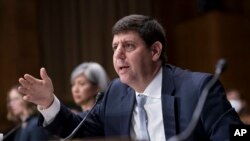 FILE - Steven Dettelbach, U.S. Bureau of Alcohol, Tobacco, Firearms and Explosives director, testifies during his confirmation hearing in Washington, May 25, 2022. Dettelbach said a new rule targeting pistol attachments known as stabilizing braces "enhances public safety."
