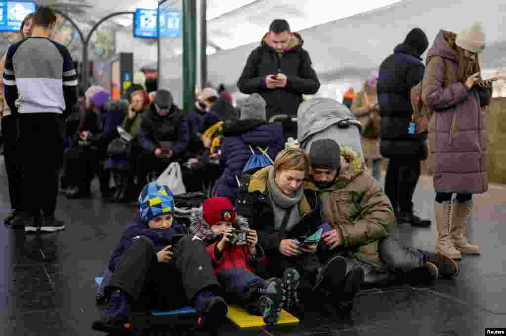 People shelter inside a metro station during massive Russian missile attacks in Kyiv, Ukraine.