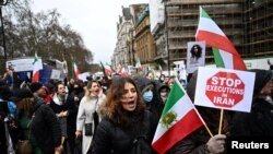 Demonstrators take part in an Iran solidarity rally in London, Britain, Jan. 8, 2023.