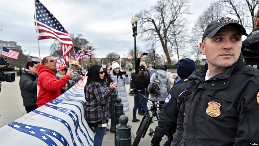 FILE - A U.S. Supreme Court police officer stands on alert in Washington on Jan. 6, 2021.