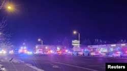 A view of various emergency vehicles are seen parked on a street, after a shooting in a club in Colorado Springs, Colorado, Nov. 20, 2022, in this picture obtained from social media. (Trey Deabueno/Twitter @TREYRUFFY/via Reuters)