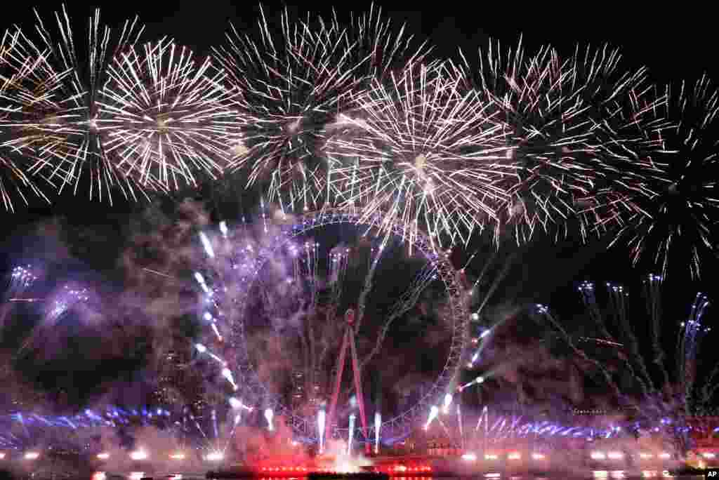 Fireworks light-up the sky over the London Eye in central London to celebrate the New Year, Jan. 1, 2023.