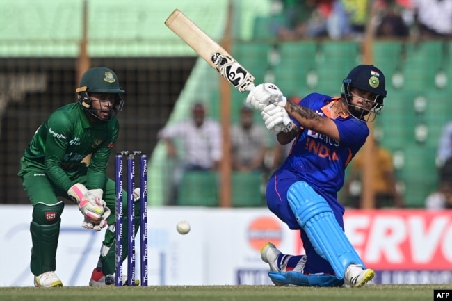 India's Ishan Kishan plays a shot during the third and final one-day international (ODI) cricket match between Bangladesh and India at the Zahur Ahmed Chowdhury Stadium in Chittagong on December 10, 2022. (Photo by Munir uz ZAMAN / AFP)