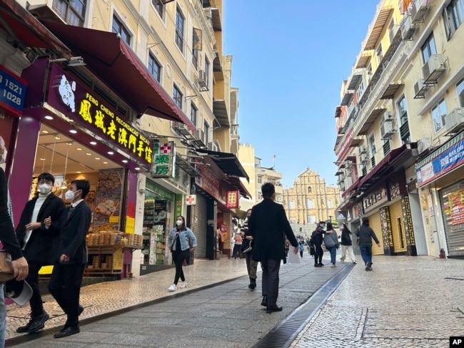 Streets around the historic site Ruins of St. Paul’s remain quiet after the easing of entry rules in Macao on Dec. 28, 2022. (AP Photo/Kanis Leung)