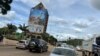 A Zanu-PF campaign poster hangs on the party’s building in Harare, Zimbabwe, Jan. 10, 2023. (Columbus Mavhunga/VOA)