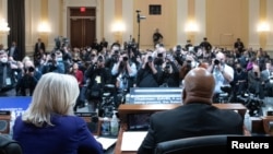 FILE - Representatives Liz Cheney, left, and Bennie Thompson at the start of a Select Committee to Investigate the January 6th attack on the U.S. Capitol hearing, in Washington, Dec. 19, 2022. President Joe Biden issued preemptive pardons to committee members on Jan. 20, 2025.