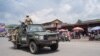 FILE - East African Community force soldiers pass through Goma, in the eastern part of the Democratic Republic of the Congo, on Dec. 2, 2022.