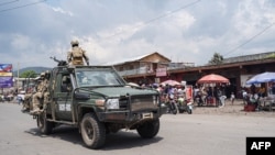 East African Community force soldiers drive in Goma in the eastern Democratic Republic of Congo, on Dec. 2, 2022. The military force is one of several diplomatic initiatives launched in an effort to ease tensions in the eastern DRC.