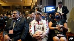 Audience members listen as President Joe Biden speaks at the White House Tribal Nations Summit at the Department of the Interior in Washington, Nov. 30, 2022.