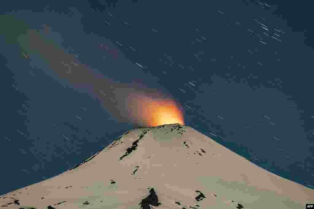 The Villarrica volcano shows signs of activity, as seen from Pucon, some 800 kilometers south of Santiago, on Dec. 1, 2022. Villarrica volcano is among the most active in South America.(Photo by MARTIN BERNETTI / AFP)