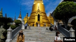 Tourists visit the Grand Palace in Bangkok, Thailand, Jan. 7, 2023. 