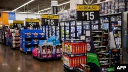 Black Friday toy sales are displayed at a Walmart store in Wilmington, Del., on Nov. 25, 2022 . With inflation on the rise, retailers are expecting that many shoppers will be looking for especially good deals as discretionary spending falls. 
