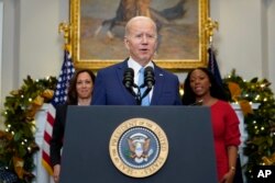 President Joe Biden speaks in the Roosevelt Room of the White House, Thursday, Dec. 8, 2022, in Washington.