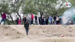 Grupos de migrantes aguardan para solicitar asilo en EEUU