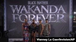 FILE - From left, Florence Kasumba, Danai Gurira, Letitia Wright and Lupita Nyong'o pose for photographers upon arrival for the premiere of the film 'Black Panther: Wakanda Forever' in London, Britain, Nov. 3, 2022. 