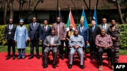 Leaders and representatives pose for photographers during the opening of East African Community (EAC)- led Nairobi Process, the third peace talk on the eastern region of Democratic Republic of Congo (DRC), in Nairobi on November 28, 2022.
