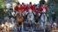 Members of the Old Surrey Burstow and West Kent Hunt ride with hounds during the annual Boxing Day hunt in Chiddingstone, Britain, Dec. 26, 2022.