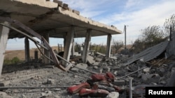 Последствия турецкого авиаудара в пригороде Дерика, Сирия. 21 ноября 2022 года.