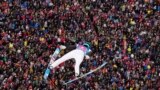 Peter Prevc of Slovenia soars through the air at the third stage of 71th Four Hills ski jumping tournament in Innsbruck, Austria, Jan. 4, 2023. 