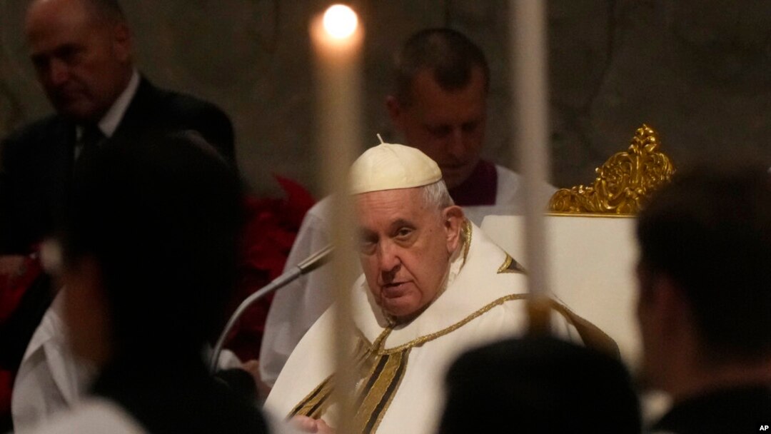 Pope Francis presides over Christmas Eve Mass, at St. Peter's Basilica at the Vatican, Dec. 24, 2022.