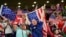 USA supporters cheer at the end of the World Cup, group B soccer match between the United States and Wales, at the Ahmad Bin Ali Stadium in Doha, Qatar, Nov. 22, 2022. The game ended in a 1-1 draw.