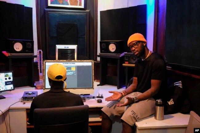 Ugandan singer Eddy Kenzo is seen at his studio in the Makindye area of the capital Kampala, Uganda Friday, Nov. 18, 2022. (AP Photo/Hajarah Nalwadda)