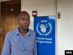 Tatenda Macheka, communications officer from the WFP in Zimbabwe, welcomes the announcement that the country has harvested enough grain to last until next year, Harare, Dec. 14, 2022. (Columbus Mavhunga/VOA)