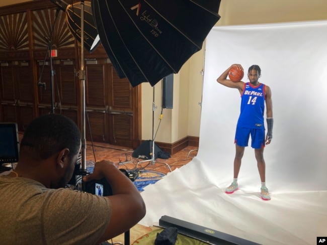 FILE - DePaul's Nick Ongenda, of Canada, poses for photos in Paradise Island, Bahamas, Nov. 19, 2022. (AP Photo/Aaron Beard)