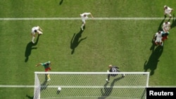 Cameroon's Jean-Charles Castelletto scores in a Group G fixture against Serbia at the 2022 FIFA World Cup, Qatar, November 28, 2022.